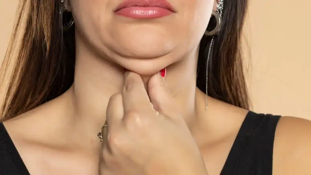An image of a woman with double chin, sad, worried : Non Surgical Double Chin Removal Treatment in Ryton on Dunsmore, UK