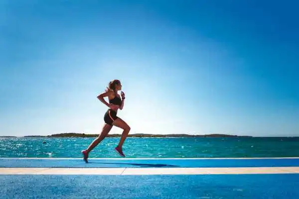 Woman running showing strong leg muscle Ryton on Dunsmore